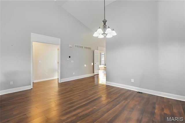 910 Ridgepointe Place Cir, Lake St Louis, MO 63367 - spare room featuring high vaulted ceiling, a chandelier, baseboards, and dark wood-style flooring