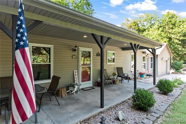5057 Port Perry Dr, Perryville, MO 63775 - view of patio / terrace featuring covered porch
