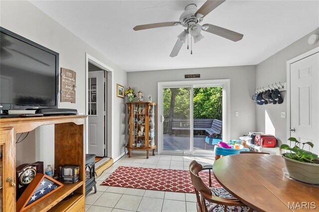 5057 Port Perry Dr, Perryville, MO 63775 - doorway to outside with light tile patterned floors and a ceiling fan