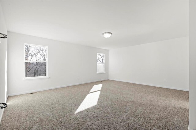 610 Tull Ct, Wentzville, MO 63385 - spare room with carpet and baseboards