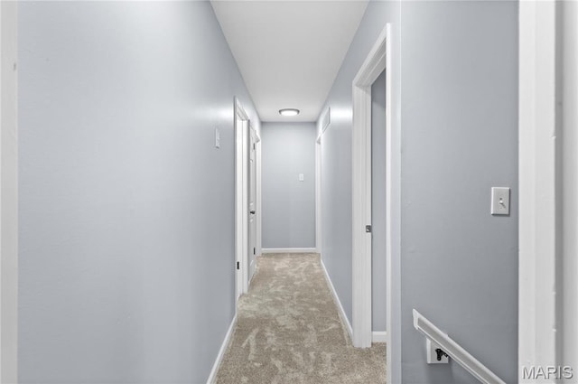 3524 Espace Ct, Florissant, MO 63034 - hall with an upstairs landing, light colored carpet, and baseboards
