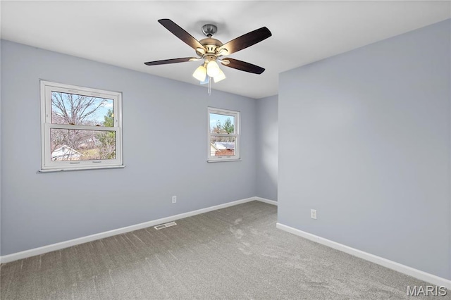 3524 Espace Ct, Florissant, MO 63034 - carpeted empty room featuring baseboards and a ceiling fan