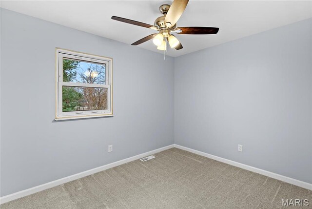 3524 Espace Ct, Florissant, MO 63034 - carpeted empty room featuring baseboards and ceiling fan