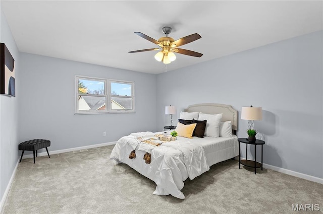 3524 Espace Ct, Florissant, MO 63034 - carpeted bedroom with baseboards and a ceiling fan