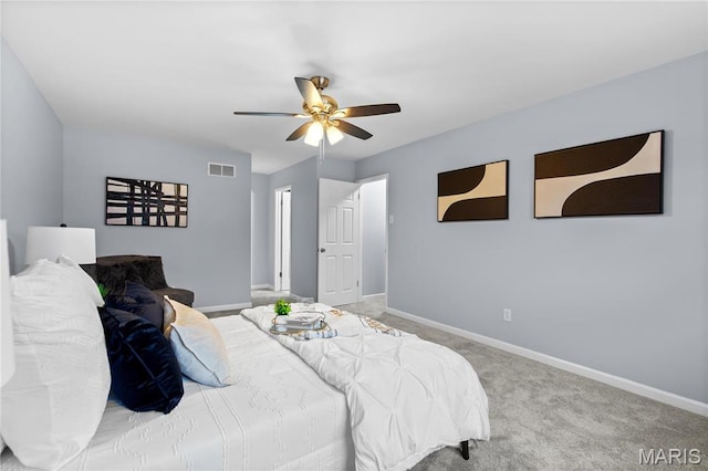 3524 Espace Ct, Florissant, MO 63034 - carpeted bedroom with baseboards and ceiling fan