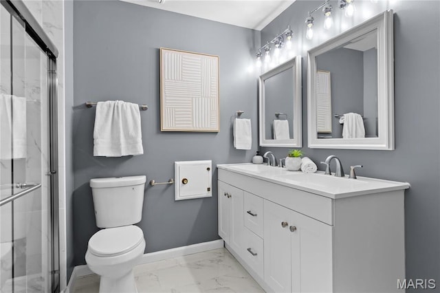 3524 Espace Ct, Florissant, MO 63034 - bathroom featuring marble finish flooring, double vanity, a marble finish shower, and toilet
