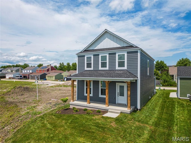177 Arpent Aly, Saint Charles, MO 63301 - view of front of house with a porch, a front lawn, and roof with shingles