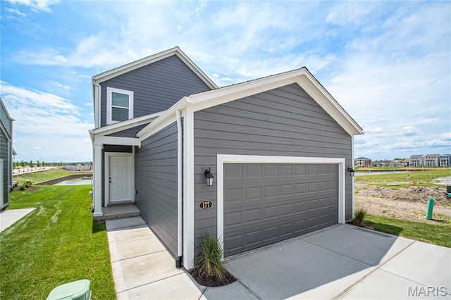 177 Arpent Aly, Saint Charles, MO 63301 - view of front facade with a water view and a front lawn