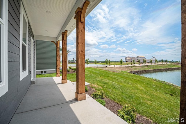 177 Arpent Aly, Saint Charles, MO 63301 - view of patio / terrace featuring a water view