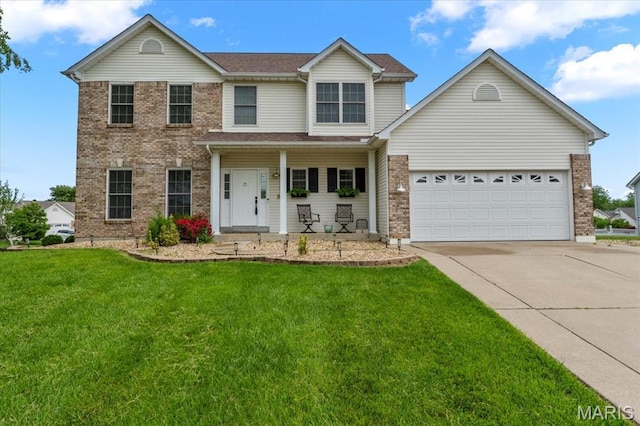 2 Meramec Shores Ct, Ofallon, MO 63366 - view of front of property featuring concrete driveway, a front lawn, a garage, brick siding, and covered porch