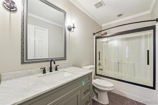 2 Meramec Shores Ct, Ofallon, MO 63366 - full bathroom featuring ornamental molding, toilet, vanity, and combined bath / shower with glass door
