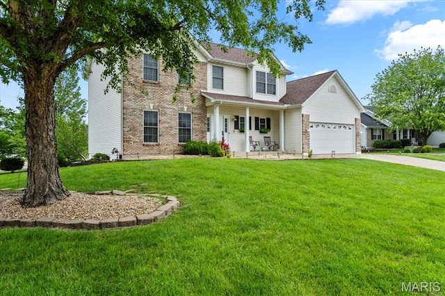2 Meramec Shores Ct, Ofallon, MO 63366 - view of front facade featuring a garage, driveway, a front yard, and brick siding