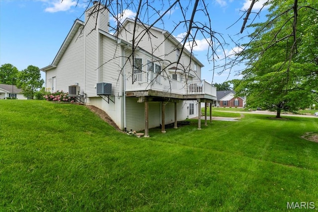 2 Meramec Shores Ct, Ofallon, MO 63366 - back of property featuring a lawn, a deck, central air condition unit, and a chimney