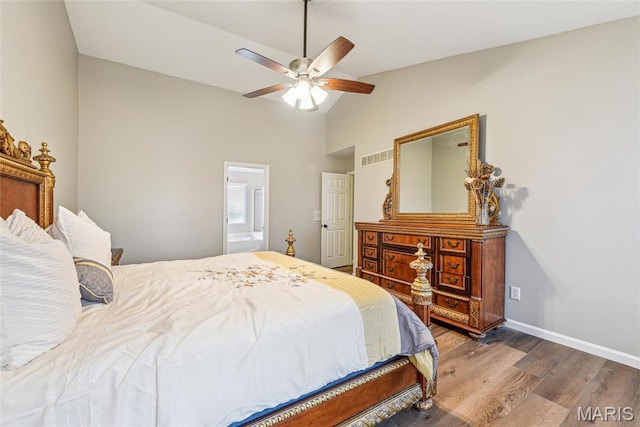 2 Meramec Shores Ct, Ofallon, MO 63366 - bedroom with lofted ceiling, wood finished floors, connected bathroom, ceiling fan, and baseboards
