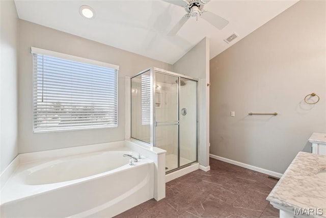 2 Meramec Shores Ct, Ofallon, MO 63366 - bathroom with a garden tub, healthy amount of natural light, a stall shower, and lofted ceiling