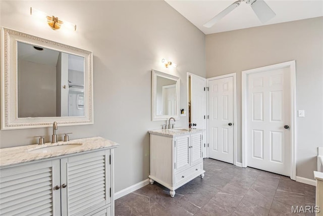 2 Meramec Shores Ct, Ofallon, MO 63366 - full bath with two vanities, baseboards, and a ceiling fan