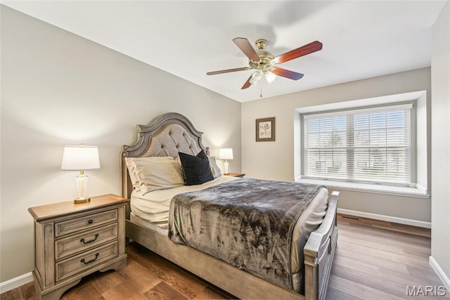 2 Meramec Shores Ct, Ofallon, MO 63366 - bedroom with wood finished floors and a ceiling fan
