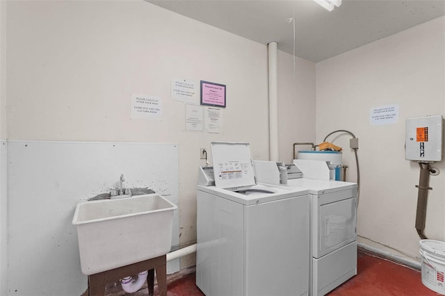 community laundry room featuring washing machine and dryer