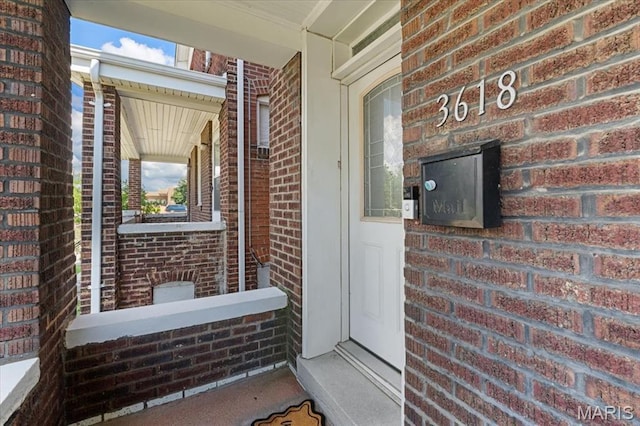 3618 Mcree Ave, Saint Louis, MO 63110 - property entrance featuring brick siding