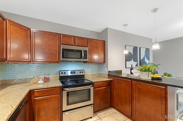 3618 Mcree Ave, Saint Louis, MO 63110 - kitchen featuring stainless steel appliances, a peninsula, tasteful backsplash, and light stone countertops