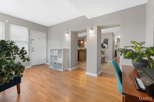 3618 Mcree Ave, Saint Louis, MO 63110 - foyer featuring light wood-style flooring and baseboards
