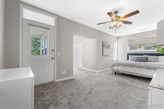 3618 Mcree Ave, Saint Louis, MO 63110 - bedroom with carpet flooring, baseboards, a ceiling fan, and a closet