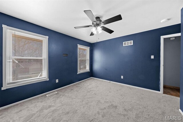 2915 Coram Dr, Saint Louis, MO 63129 - empty room with carpet floors, a ceiling fan, baseboards, and a smoke detector