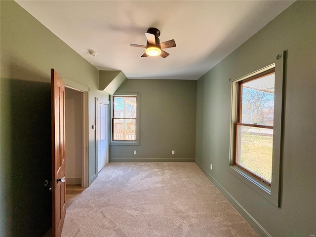 107 S Jackson St, Perryville, MO 63775 - unfurnished bedroom featuring light carpet, baseboards, and ceiling fan