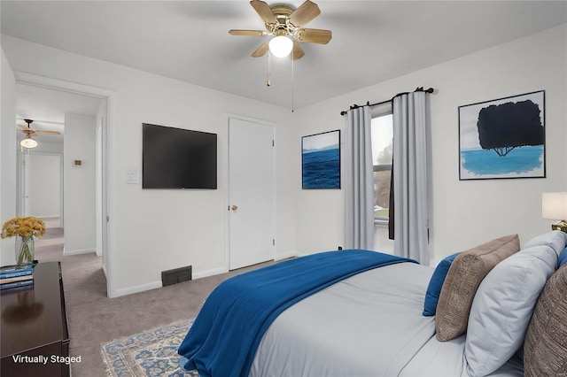 1163 Peace Valley Ln, Hermann, MO 65041 - bedroom with carpet, baseboards, and ceiling fan