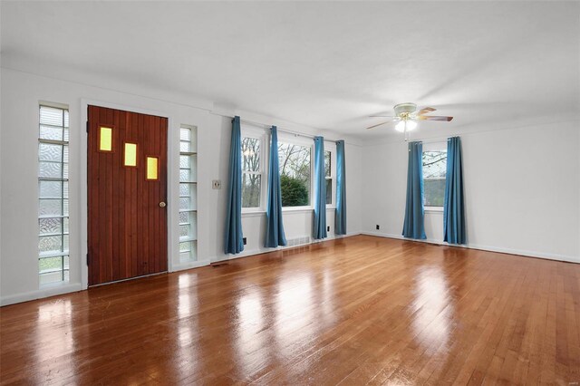 1163 Peace Valley Ln, Hermann, MO 65041 - entrance foyer with hardwood / wood-style flooring and a ceiling fan