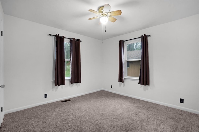 1163 Peace Valley Ln, Hermann, MO 65041 - spare room with carpet floors, a ceiling fan, and baseboards