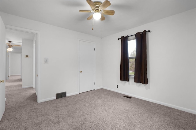 1163 Peace Valley Ln, Hermann, MO 65041 - carpeted empty room featuring ceiling fan and baseboards