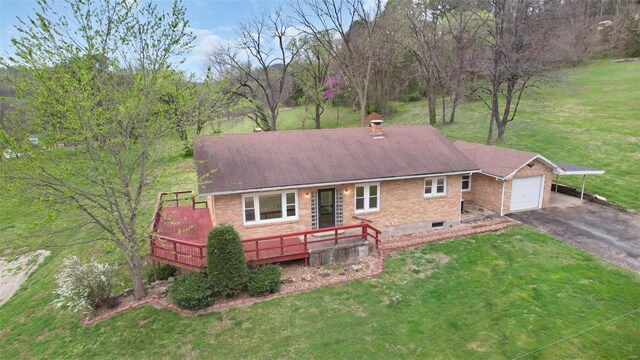 1163 Peace Valley Ln, Hermann, MO 65041 - back of house with a yard, a deck, driveway, and brick siding