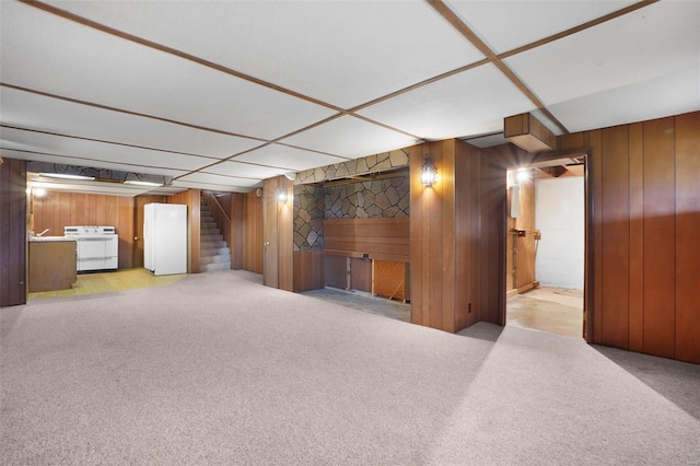 1163 Peace Valley Ln, Hermann, MO 65041 - finished basement with wood walls, stairway, and carpet