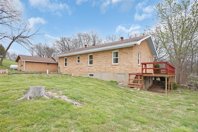 1163 Peace Valley Ln, Hermann, MO 65041 - rear view of house with a deck, a chimney, brick siding, a yard, and a shingled roof