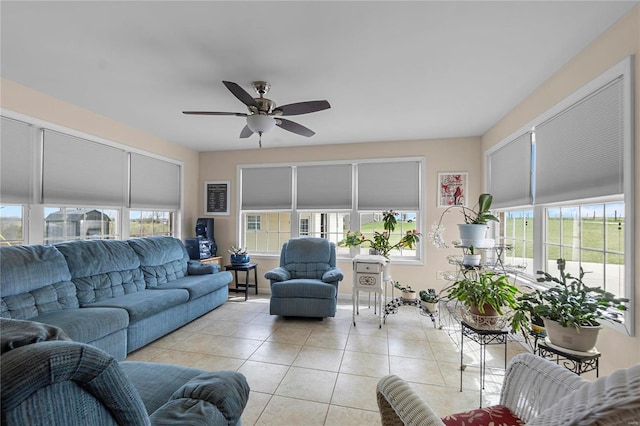 living room featuring light tile patterned flooring and a ceiling fan