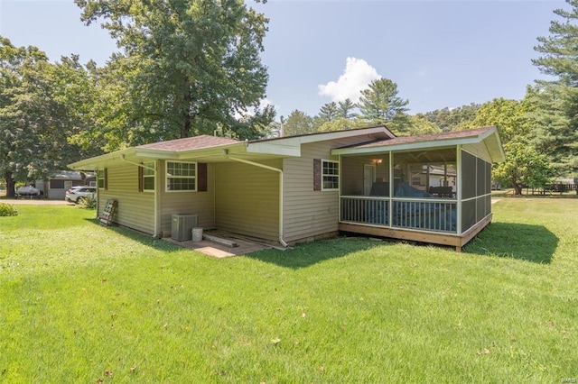 13 Wayne 357b, Piedmont, MO 63957 - rear view of house featuring a yard, a sunroom, and central AC unit