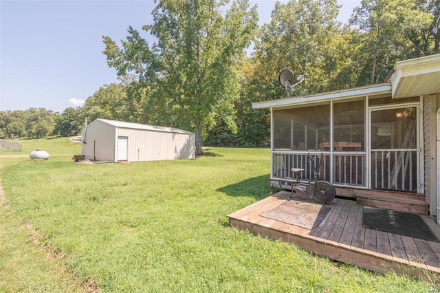 13 Wayne 357b, Piedmont, MO 63957 - view of green lawn with a sunroom, an outdoor structure, and view of wooded area