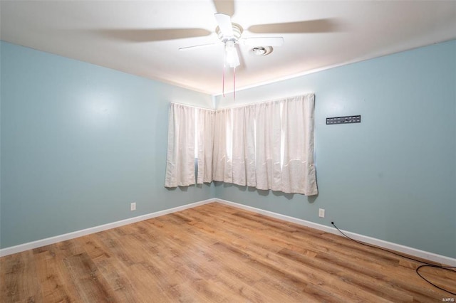 13 Wayne 357b, Piedmont, MO 63957 - empty room with wood finished floors, baseboards, and a ceiling fan