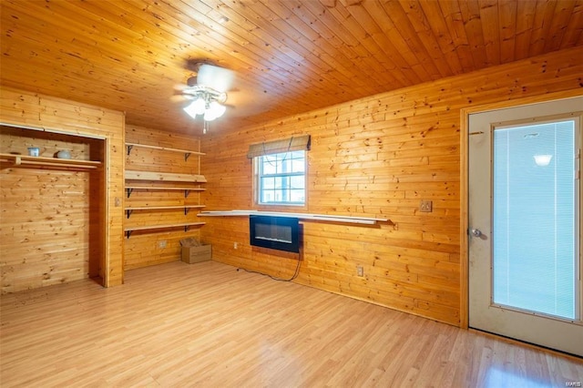 13 Wayne 357b, Piedmont, MO 63957 - unfurnished living room featuring wood walls, light wood-type flooring, ceiling fan, and wood ceiling