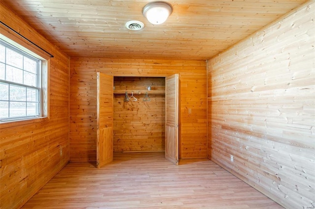 13 Wayne 357b, Piedmont, MO 63957 - unfurnished bedroom featuring wooden walls, a closet, wooden ceiling, and light wood-style flooring