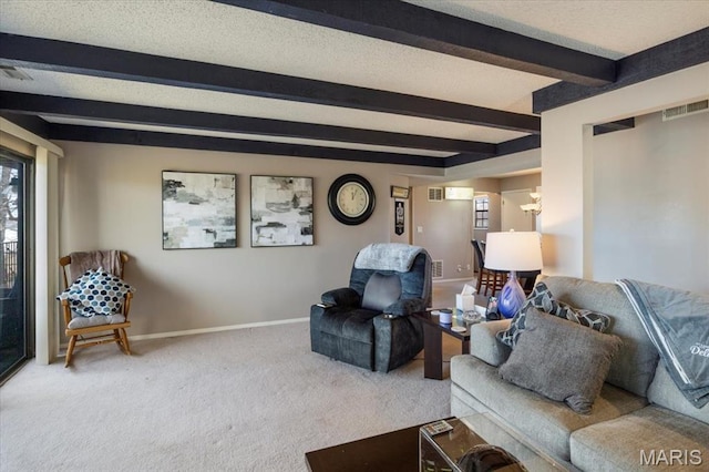 92 Waters Edge Ct Unit 15-2B, Four Seasons, MO 65049 - carpeted living room featuring beamed ceiling and baseboards
