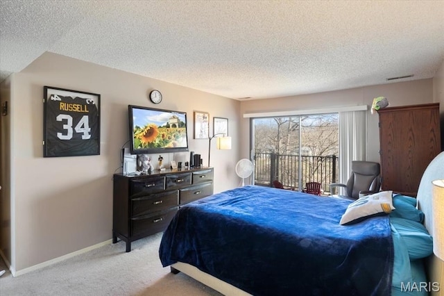 92 Waters Edge Ct Unit 15-2B, Four Seasons, MO 65049 - bedroom with light colored carpet, a textured ceiling, and baseboards