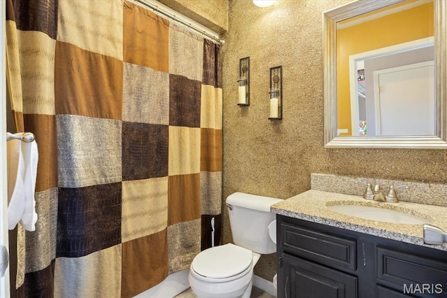 92 Waters Edge Ct Unit 15-2B, Four Seasons, MO 65049 - bathroom featuring vanity and toilet