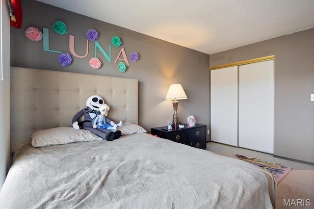 92 Waters Edge Ct Unit 15-2B, Four Seasons, MO 65049 - bedroom with carpet flooring and a closet