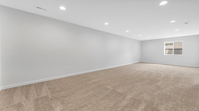 149 Haven Ridge Ct, Dardenne Prairie, MO 63368 - unfurnished room featuring light carpet, recessed lighting, and baseboards