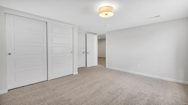 149 Haven Ridge Ct, Dardenne Prairie, MO 63368 - unfurnished bedroom with carpet, baseboards, and a closet