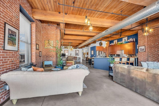 living room featuring brick wall, wooden ceiling, finished concrete flooring, and beam ceiling