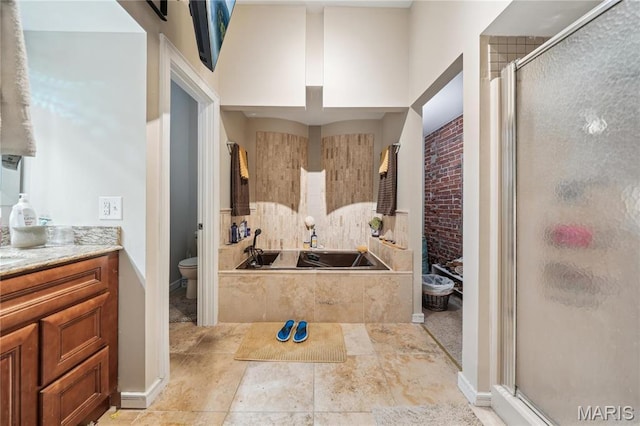 1906 Lasalle St, Saint Louis, MO 63104 - full bath featuring a stall shower, toilet, a garden tub, and vanity