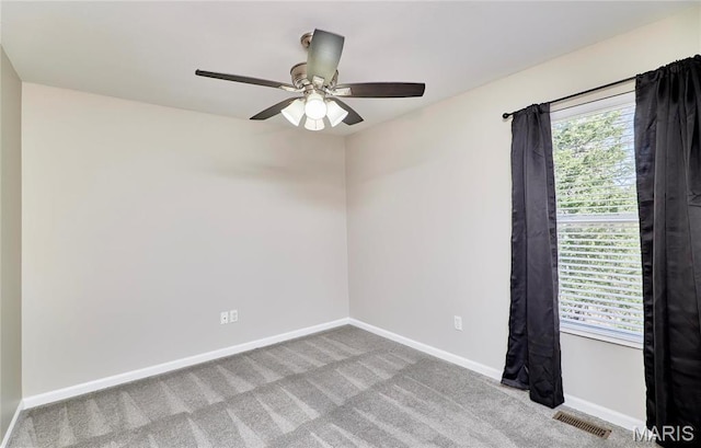460 Fortress Ct, Saint Charles, MO 63303 - spare room featuring a ceiling fan, carpet floors, and baseboards